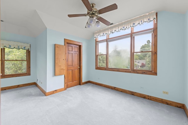 506 Carleton Ave, Glen Ellyn, IL 60137 - unfurnished room featuring baseboards, light colored carpet, vaulted ceiling, and ceiling fan