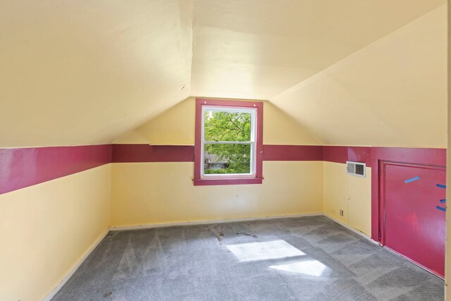 506 Carleton Ave, Glen Ellyn, IL 60137 - additional living space with carpet floors, lofted ceiling, and baseboards