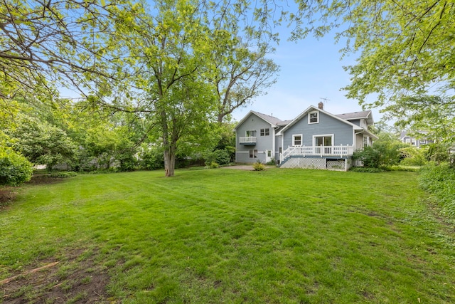 506 Carleton Ave, Glen Ellyn, IL 60137 - view of green lawn with a wooden deck
