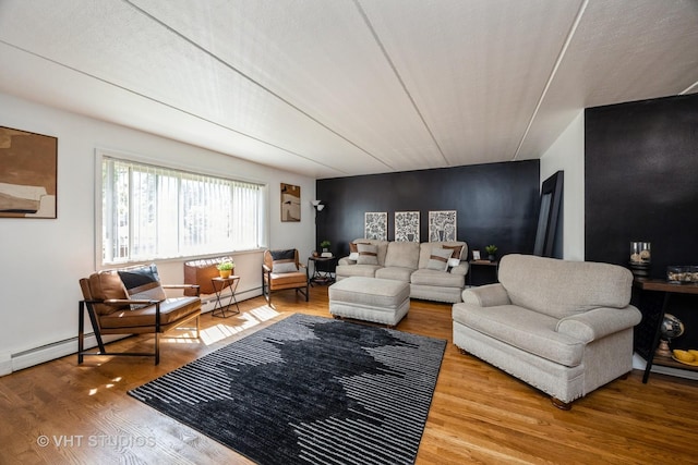 914 N Austin Blvd Unit B10, Oak Park, IL 60302 - living room with a baseboard heating unit and wood finished floors