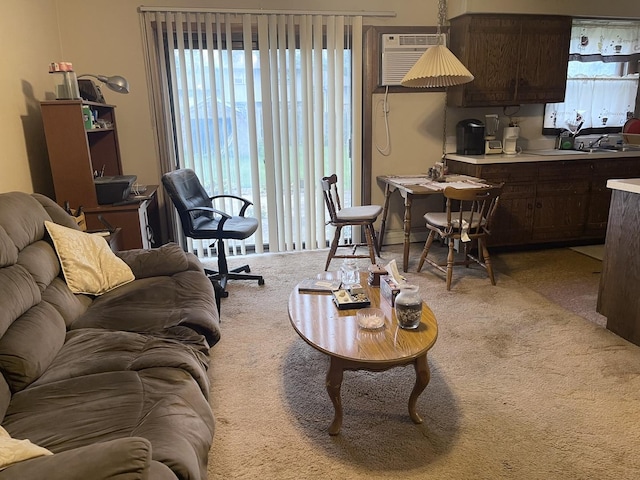 1410 Brentwood Pl, Joliet, IL 60435 - living room featuring light colored carpet, plenty of natural light, and a wall mounted air conditioner