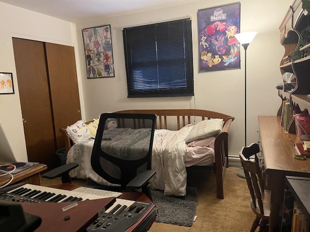 1410 Brentwood Pl, Joliet, IL 60435 - bedroom featuring carpet, a closet, and a baseboard radiator