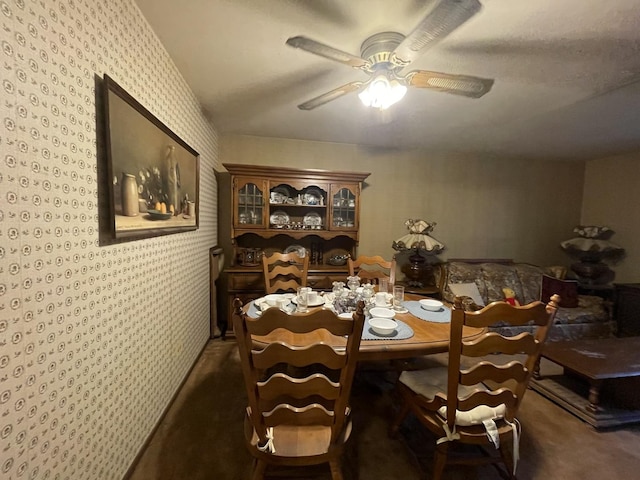 1410 Brentwood Pl, Joliet, IL 60435 - dining room featuring a ceiling fan, wallpapered walls, and carpet floors
