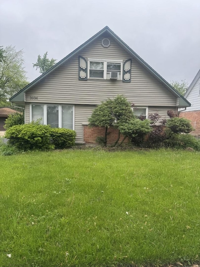 3936 169th St, Country Club Hills, IL 60478 - view of side of property featuring a lawn and cooling unit