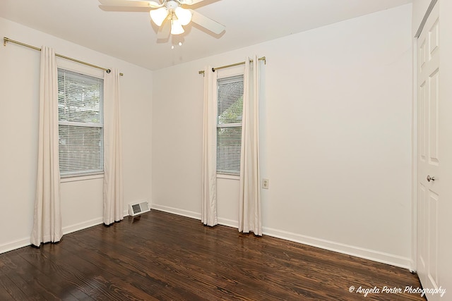 33978 N Lake Rd, Grayslake, IL 60030 - unfurnished room with dark wood-type flooring, a ceiling fan, and baseboards