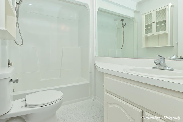 33978 N Lake Rd, Grayslake, IL 60030 - full bathroom featuring vanity, toilet, shower / bath combination, and speckle patterned floor