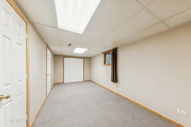 841 Bonnie Brae Ln, Bolingbrook, IL 60440 - unfurnished bedroom with a drop ceiling, light colored carpet, baseboards, and a closet