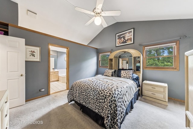 841 Bonnie Brae Ln, Bolingbrook, IL 60440 - bedroom with light carpet, vaulted ceiling, baseboards, ensuite bathroom, and a ceiling fan