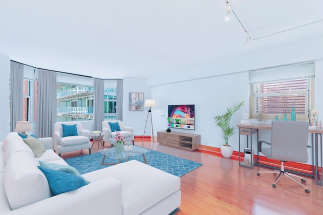 535 N Michigan Ave Unit 1009, Chicago, IL 60611 - living room with wood finished floors and rail lighting