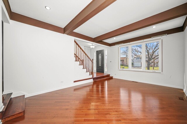 975 Patriot Ln, Hoffman Estates, IL 60192 - unfurnished living room featuring stairway, wood finished floors, beamed ceiling, baseboards, and recessed lighting