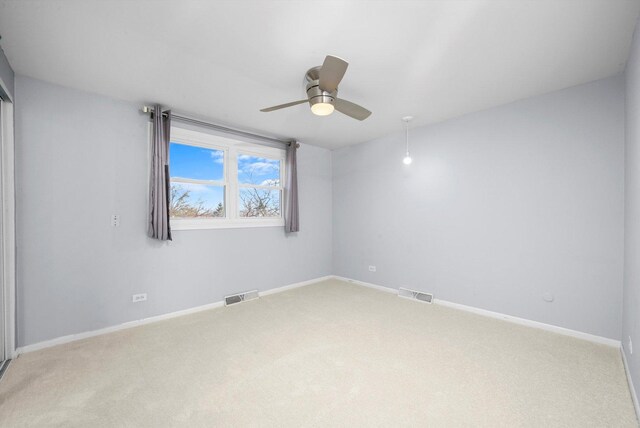 975 Patriot Ln, Hoffman Estates, IL 60192 - empty room with ceiling fan, light carpet, and baseboards