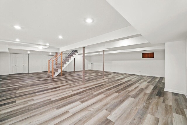 975 Patriot Ln, Hoffman Estates, IL 60192 - finished basement with wood finished floors, recessed lighting, stairway, and baseboards