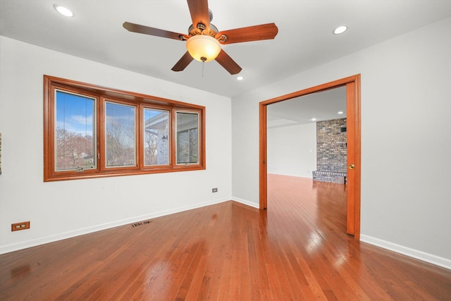 975 Patriot Ln, Hoffman Estates, IL 60192 - empty room featuring ceiling fan, wood-type flooring, baseboards, and recessed lighting
