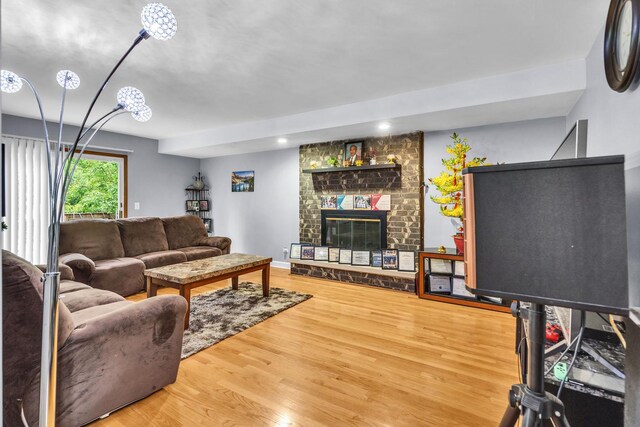 2015 Busse Hwy, Des Plaines, IL 60016 - living area with wood finished floors, a fireplace, recessed lighting, and a chandelier