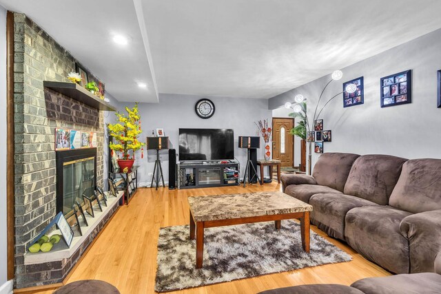 2015 Busse Hwy, Des Plaines, IL 60016 - living room with light wood-type flooring, a brick fireplace, and recessed lighting