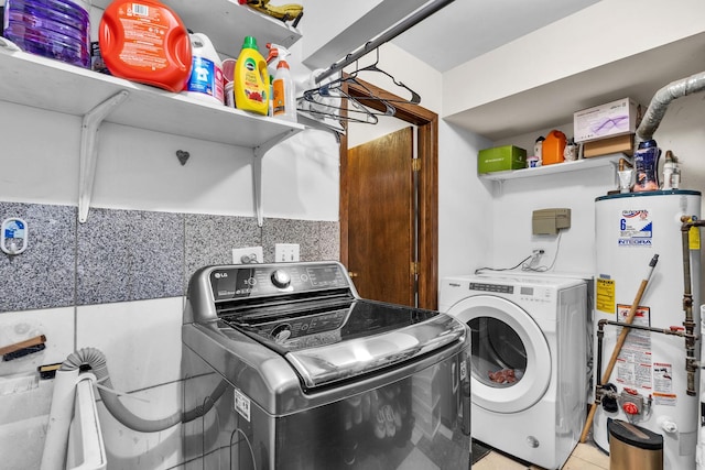 2015 Busse Hwy, Des Plaines, IL 60016 - laundry room with water heater, washer and dryer, and light tile patterned floors