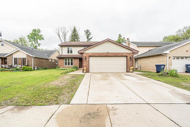 2015 Busse Hwy, Des Plaines, IL 60016 - traditional-style home featuring a garage, brick siding, a front yard, and driveway