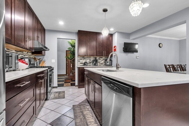 2015 Busse Hwy, Des Plaines, IL 60016 - kitchen featuring appliances with stainless steel finishes, a sink, backsplash, light countertops, and under cabinet range hood