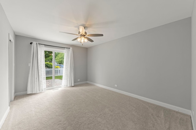 1802 77th St, Naperville, IL 60565 - spare room with light colored carpet, a ceiling fan, and baseboards