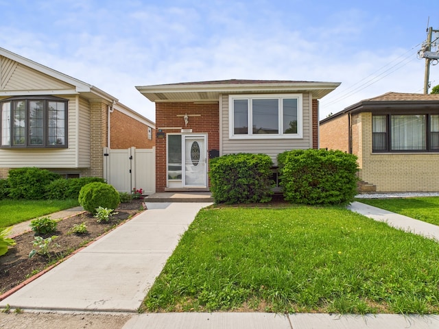 3455 W 115th St, Chicago, IL 60655 - view of front of home with a front yard and a gate
