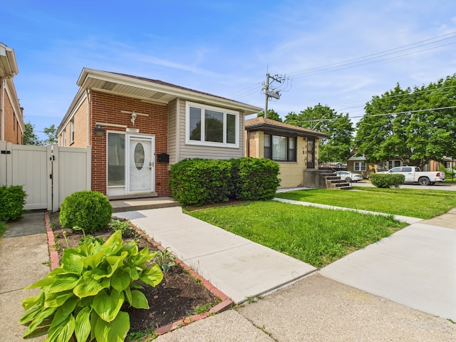 3455 W 115th St, Chicago, IL 60655 - view of front of home featuring a gate and brick siding