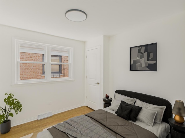 3455 W 115th St, Chicago, IL 60655 - bedroom featuring wood finished floors and baseboards
