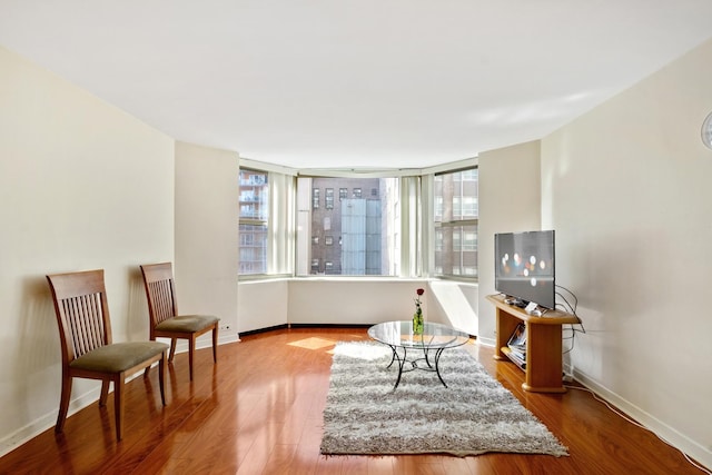 535 N Michigan Ave Unit 1205, Chicago, IL 60611 - living area with healthy amount of natural light, wood finished floors, and baseboards