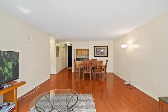 535 N Michigan Ave Unit 1205, Chicago, IL 60611 - dining space featuring wood finished floors and baseboards