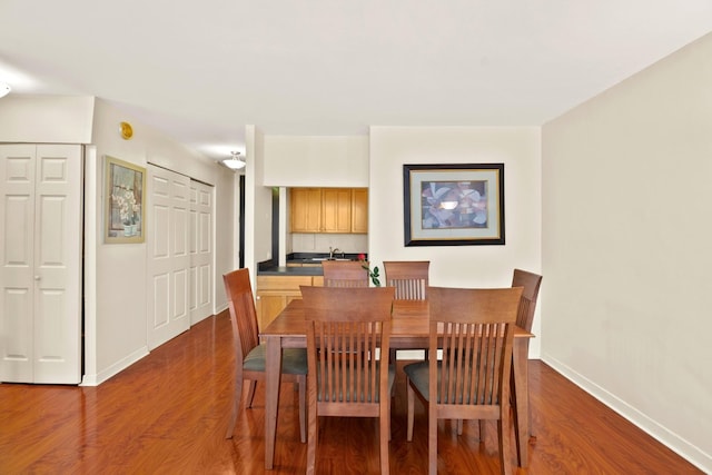 535 N Michigan Ave Unit 1205, Chicago, IL 60611 - dining space with baseboards and wood finished floors