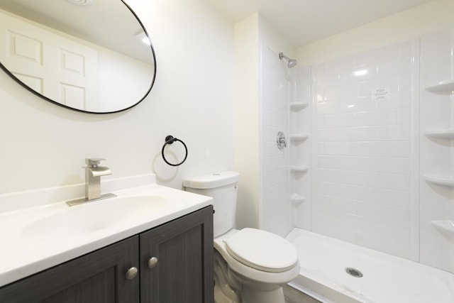 1525 Grove Dr, Round Lake Beach, IL 60073 - bathroom with vanity, toilet, and a shower