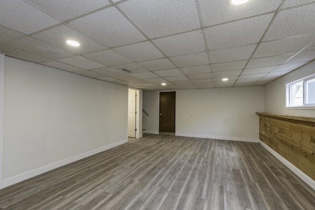 1525 Grove Dr, Round Lake Beach, IL 60073 - basement featuring wood finished floors, baseboards, recessed lighting, and a drop ceiling