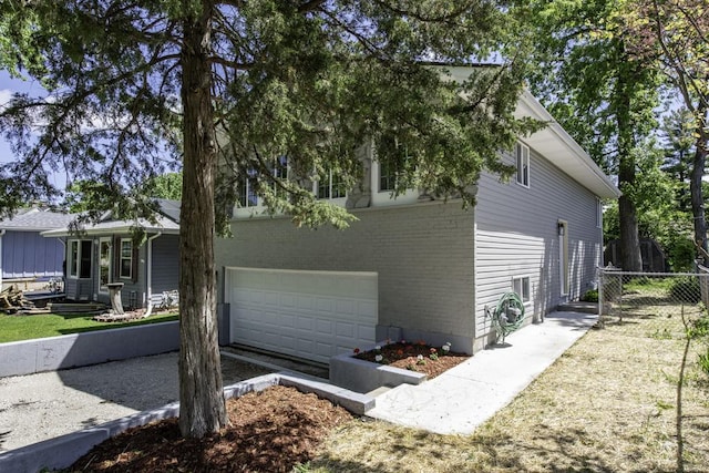 1525 Grove Dr, Round Lake Beach, IL 60073 - view of side of property with brick siding