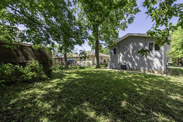 1525 Grove Dr, Round Lake Beach, IL 60073 - view of yard featuring central AC unit