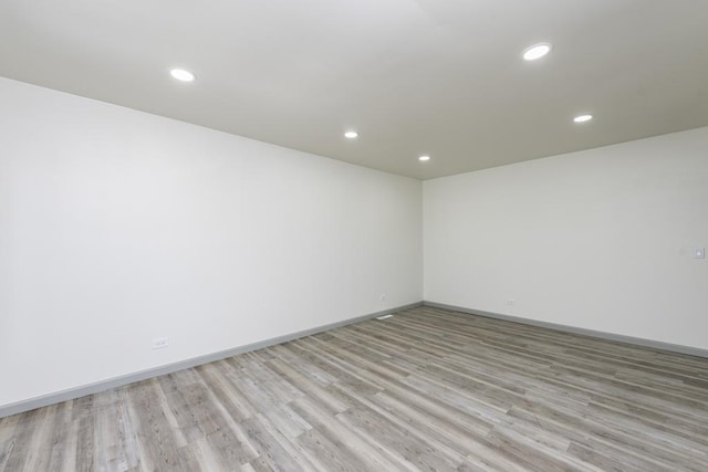 1525 Grove Dr, Round Lake Beach, IL 60073 - empty room featuring recessed lighting, light wood-style flooring, and baseboards