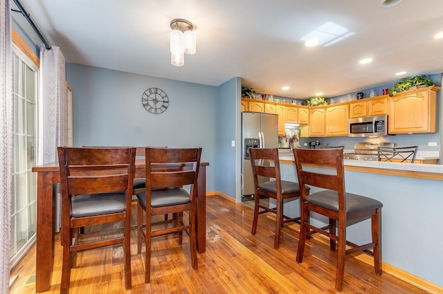 18225 Eagle Dr, Tinley Park, IL 60477 - dining area featuring light wood-style floors, baseboards, and recessed lighting