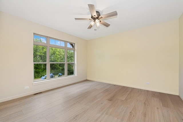3515 Kings Lair Dr, Spring Grove, IL 60081 - spare room featuring light wood-style flooring and a ceiling fan