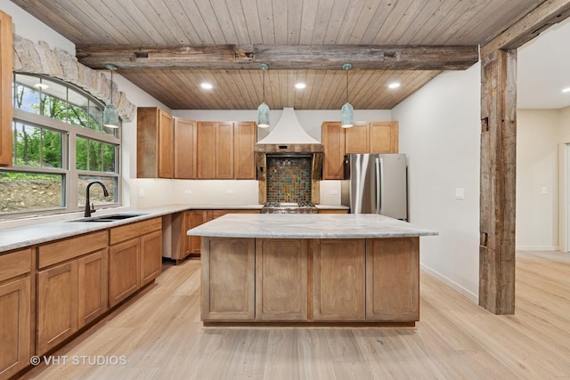 3515 Kings Lair Dr, Spring Grove, IL 60081 - kitchen featuring freestanding refrigerator, premium range hood, light wood-style flooring, a center island, and decorative backsplash
