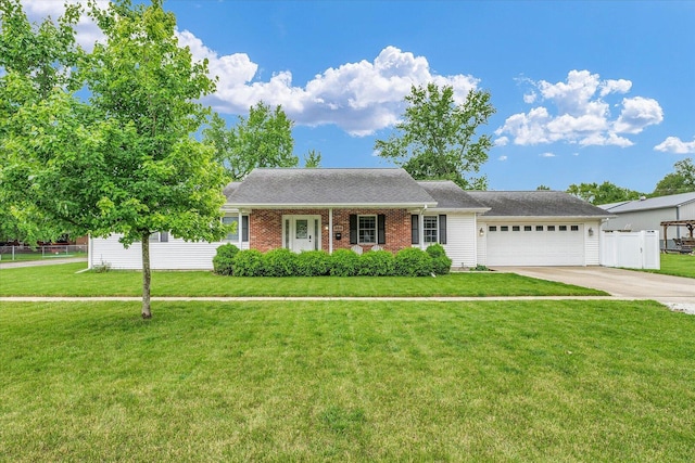956 E Orleans St, Paxton, IL 60957 - view of front of home featuring a garage, concrete driveway, and brick siding