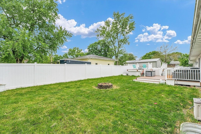 956 E Orleans St, Paxton, IL 60957 - view of yard featuring an outdoor fire pit and a wooden deck
