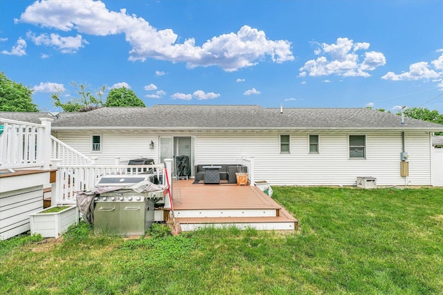 956 E Orleans St, Paxton, IL 60957 - rear view of house featuring a deck, a yard, and roof with shingles