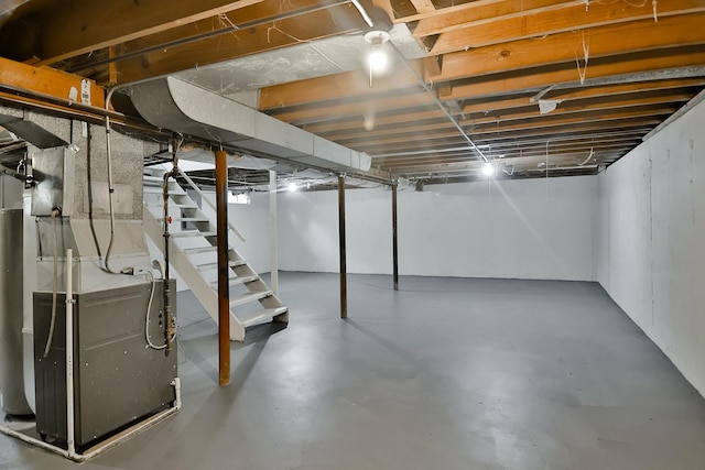 1726 5th Ave, Belvidere, IL 61008 - unfinished below grade area featuring stairs and heating unit
