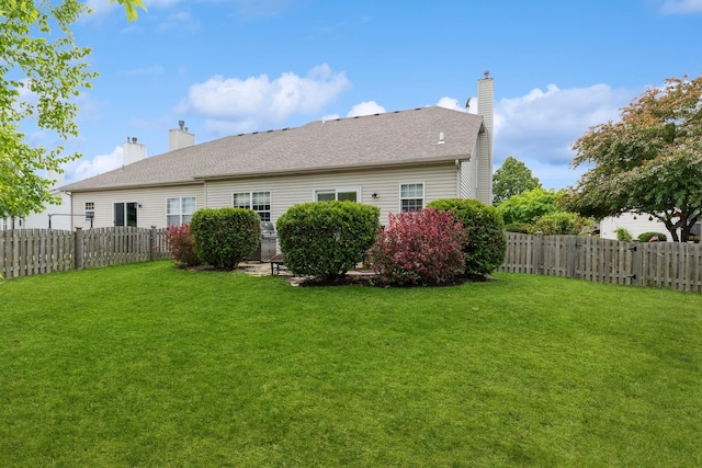 13555 Golden Eagle Cir, Plainfield, IL 60544 - rear view of property with a chimney