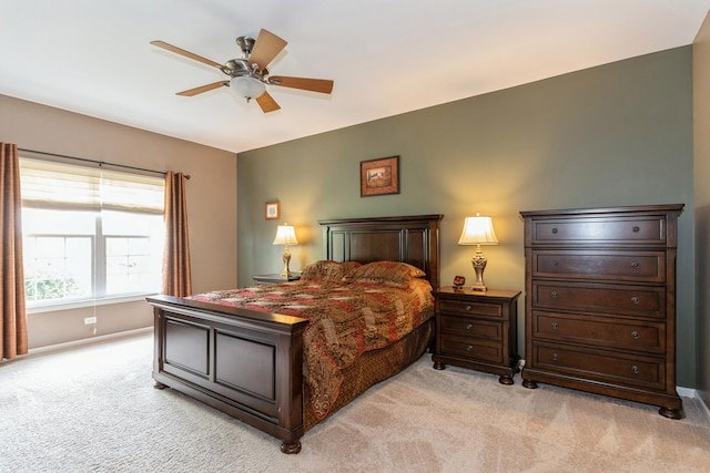 13555 Golden Eagle Cir, Plainfield, IL 60544 - bedroom featuring light carpet, baseboards, and ceiling fan