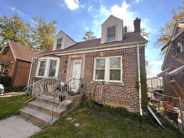 618 Emerald Ave, Chicago Heights, IL 60411 - view of front of home with brick siding and a chimney