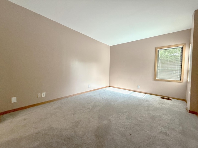 727 S Ashland Ave Unit C, Chicago, IL 60607 - unfurnished room featuring baseboards and carpet floors