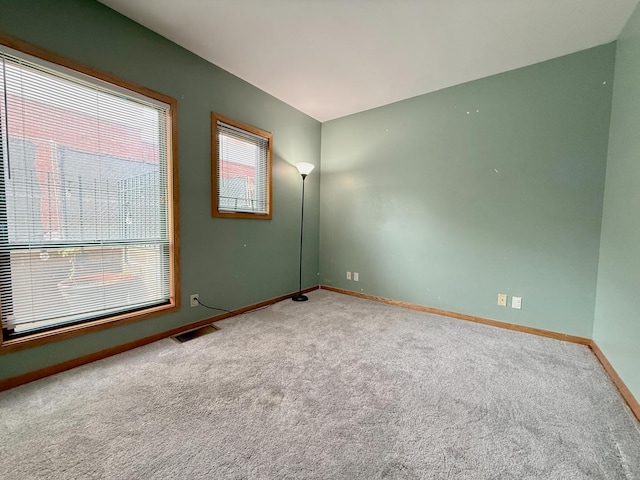 727 S Ashland Ave Unit C, Chicago, IL 60607 - carpeted empty room featuring baseboards