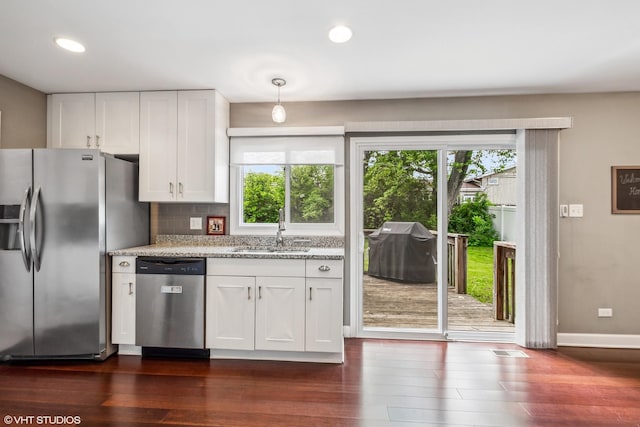 5142 Deerpath Rd, Oak Forest, IL 60452 - kitchen featuring appliances with stainless steel finishes, a sink, healthy amount of natural light, dark wood-type flooring, and recessed lighting