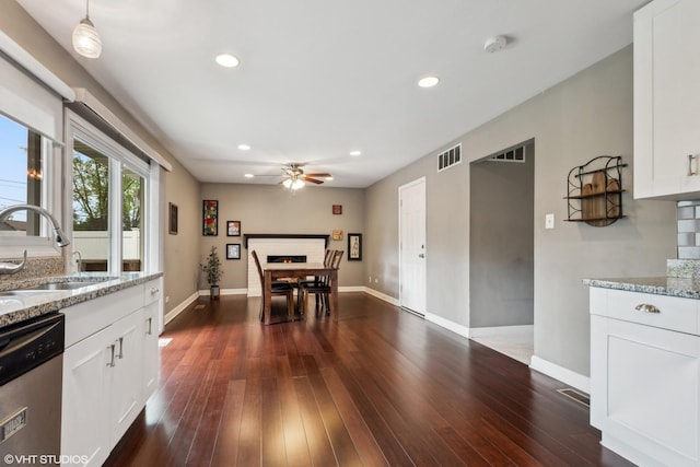5142 Deerpath Rd, Oak Forest, IL 60452 - dining space with a ceiling fan, baseboards, recessed lighting, dark wood-style flooring, and a lit fireplace