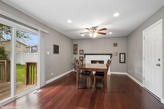 5142 Deerpath Rd, Oak Forest, IL 60452 - dining space with ceiling fan, dark wood-style flooring, recessed lighting, a brick fireplace, and baseboards