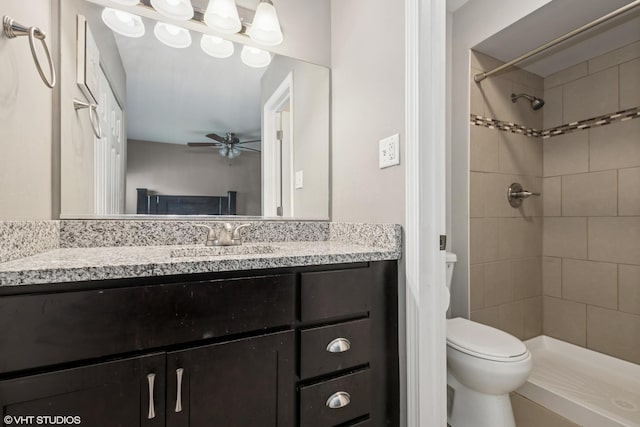 5142 Deerpath Rd, Oak Forest, IL 60452 - full bathroom with toilet, ceiling fan, vanity, and a tile shower